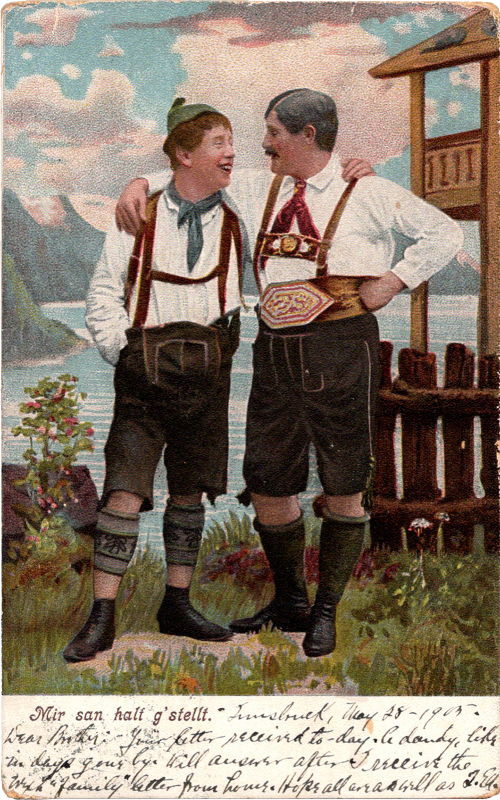 two men wearing lederhosen