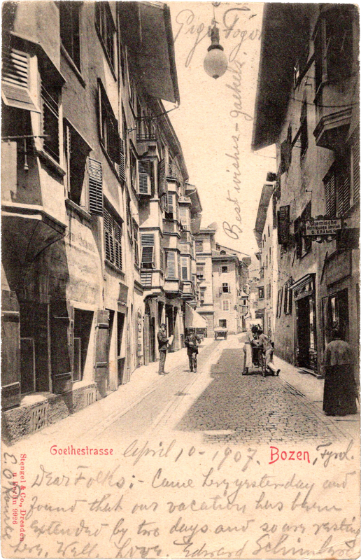 a street with buildings and people