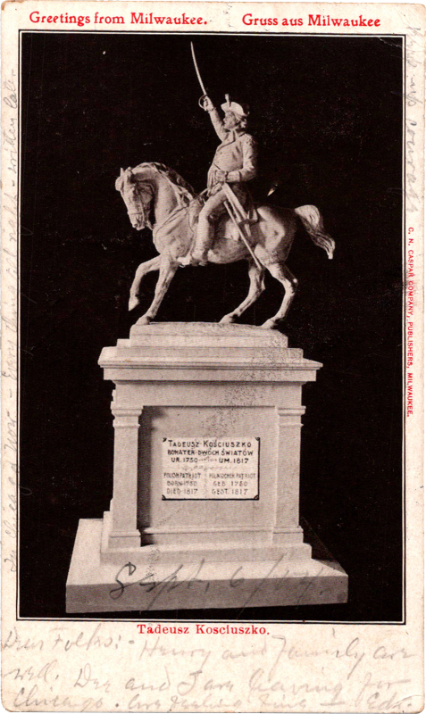 a statue of a person riding a horse