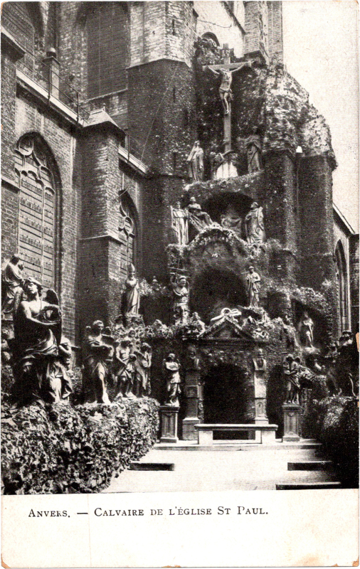 a stone building with statues