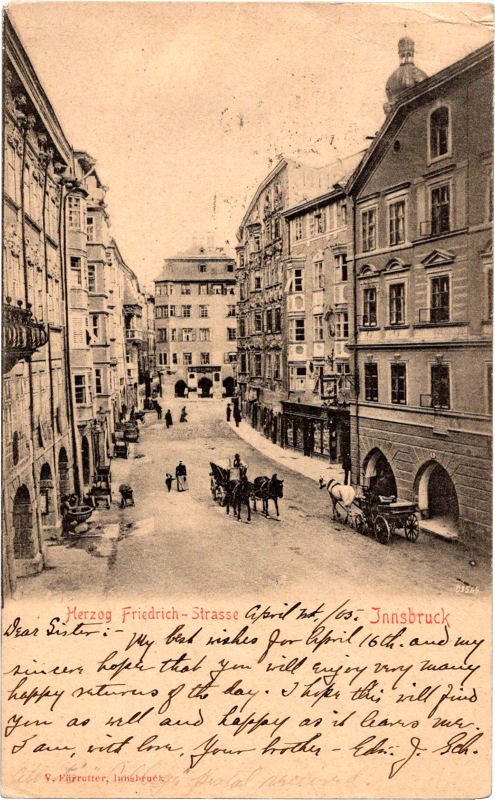 a horse drawn carriage in a street