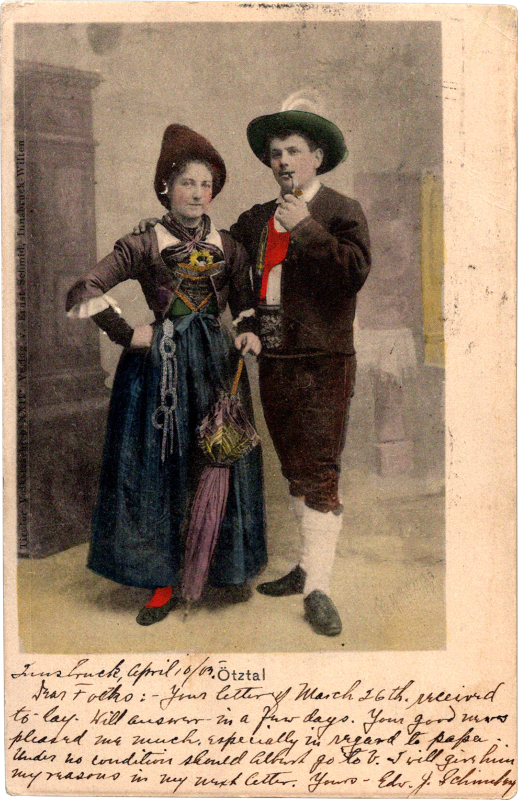 a woman and man in traditional clothing
