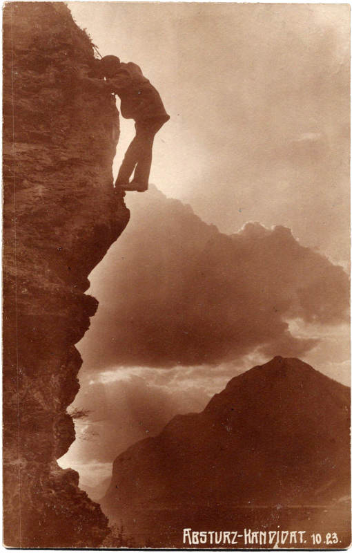 a person climbing a cliff