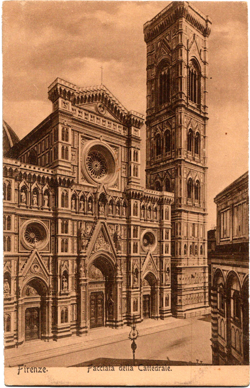 a large ornate building with a tower