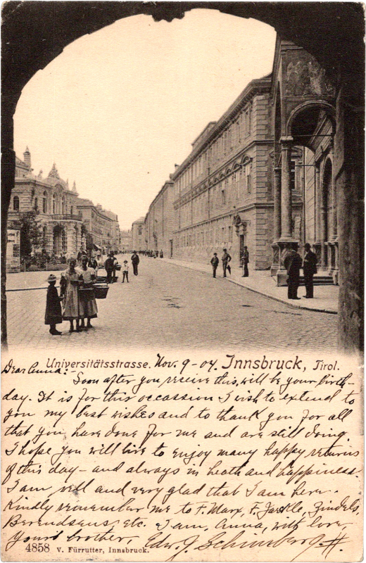 a group of people walking down a street
