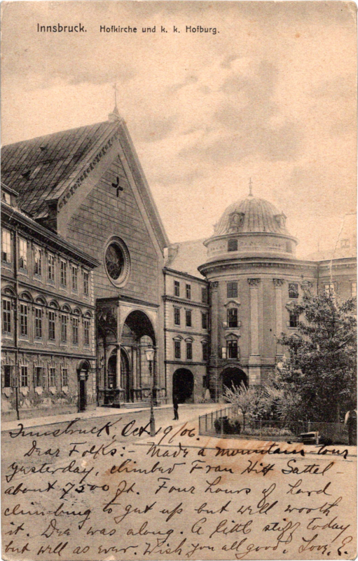 a building with a dome and a tree