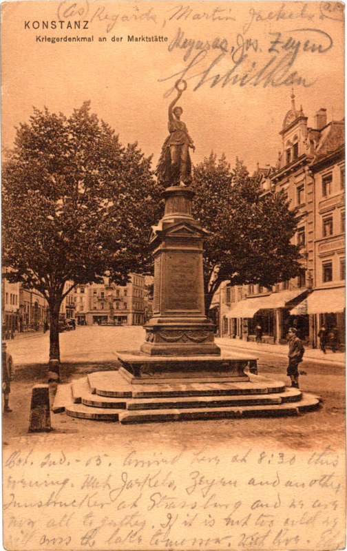 a statue of a person in a city