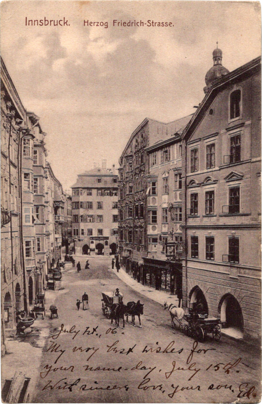 a horse drawn carriage in a street