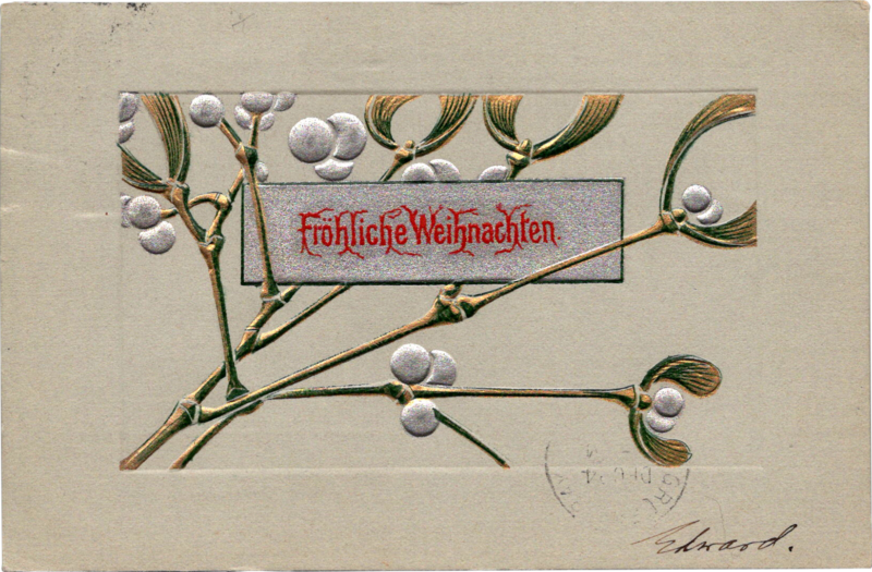 a card with silver and gold embossed branches and red text