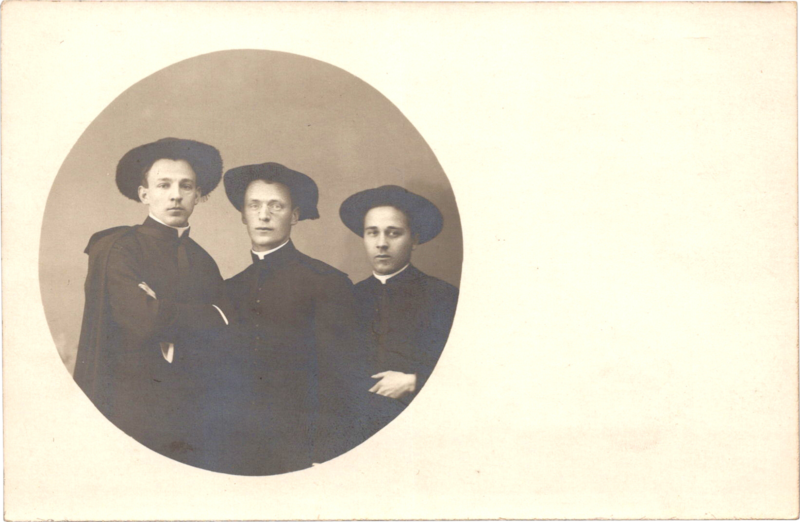 a group of men posing for a picture