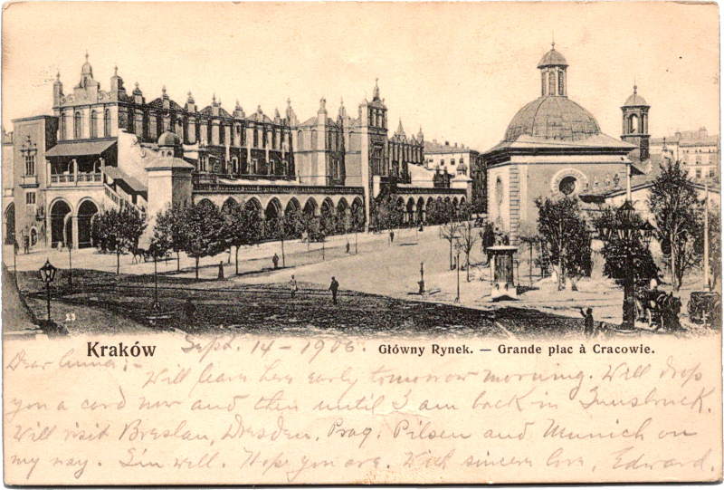 a postcard with a building and a street