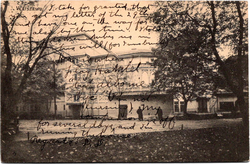 a building with trees and text