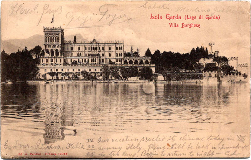 a building next to a body of water