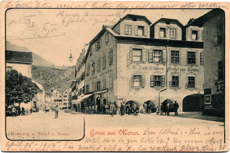 a group of people standing outside a building