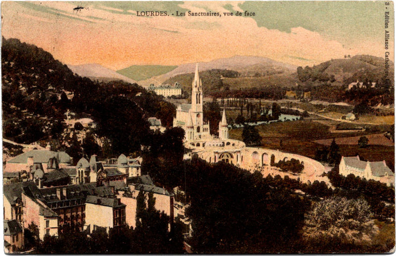 a large white building with a steeple and a river in the background