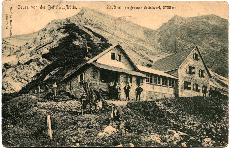 a group of people standing outside a building