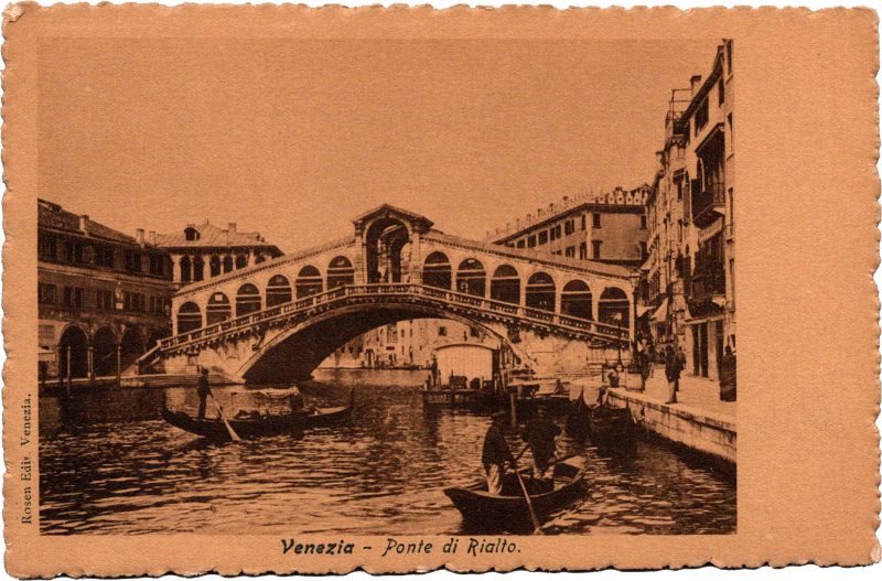 a bridge over water with boat