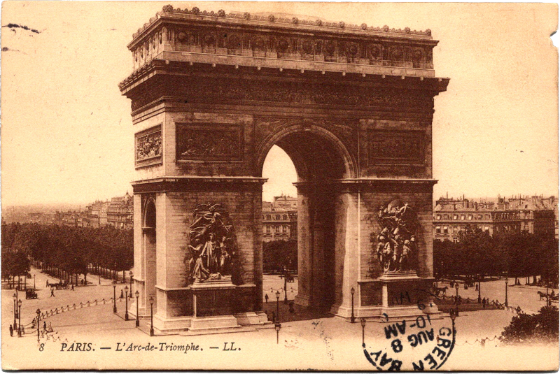 a large stone arch with statues