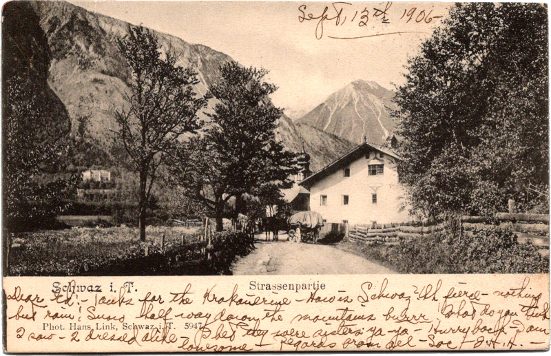 a house with a carriage and trees in front of it