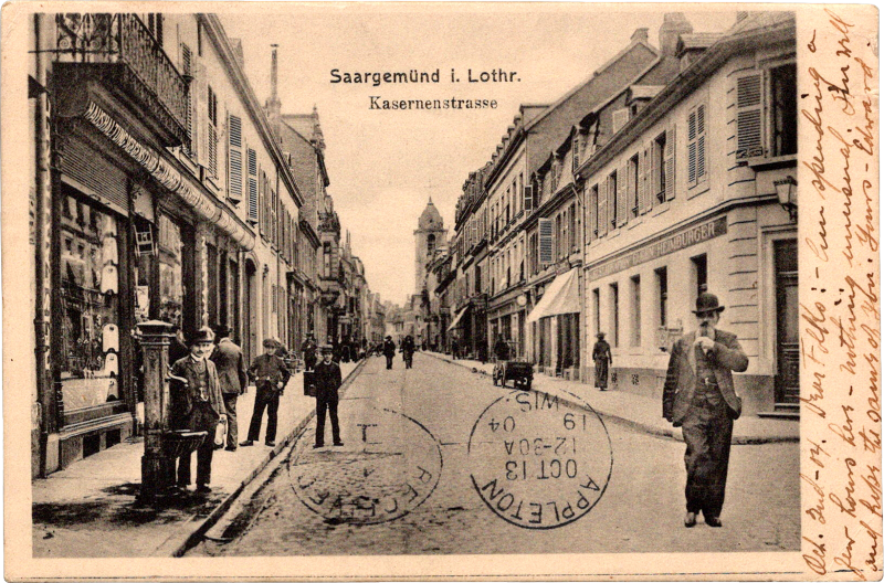 a group of people walking down a street