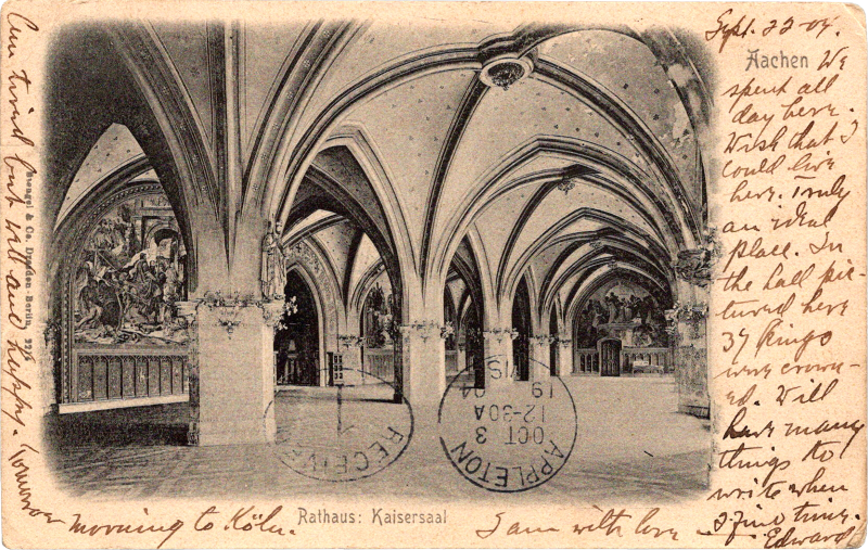 a black and white photo of a building with arches and columns