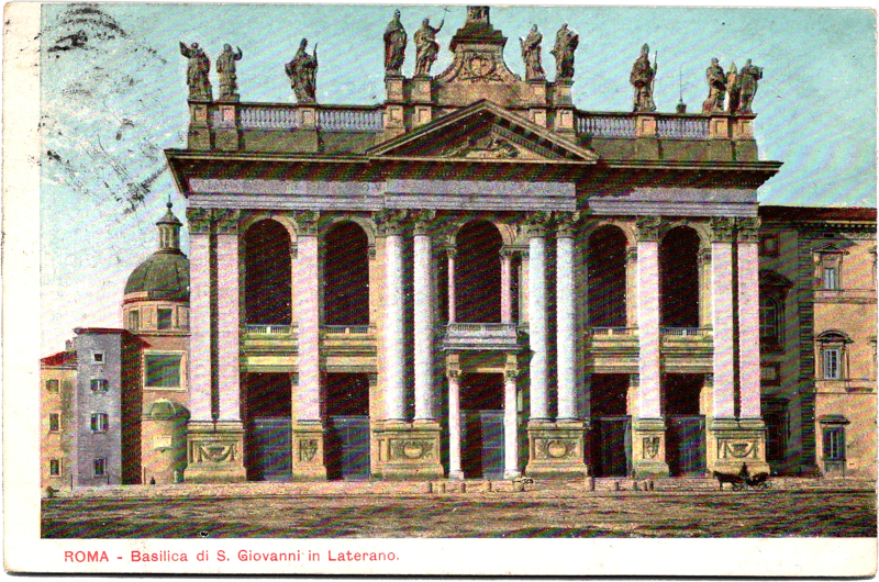 a building with columns and statues