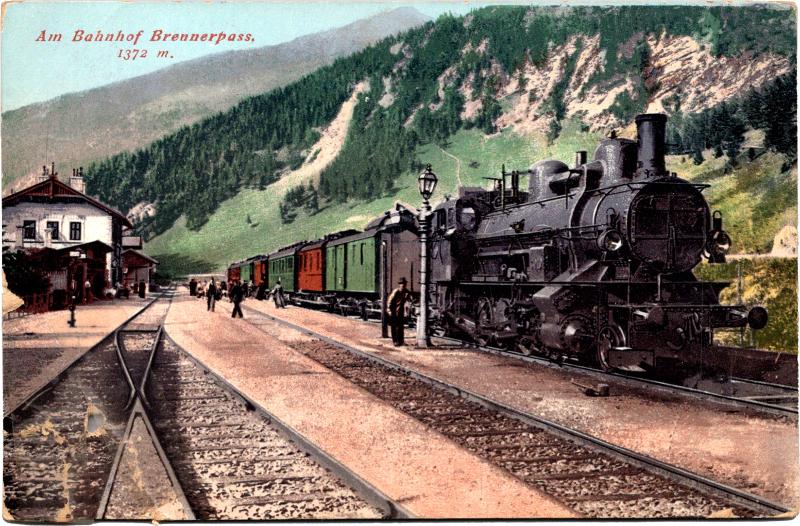 A train is stopped at a train station.
