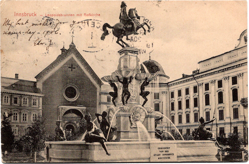 A statue of a horse on top of a fountain.