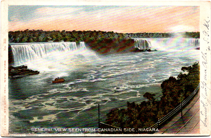 a large waterfall with a boat in it